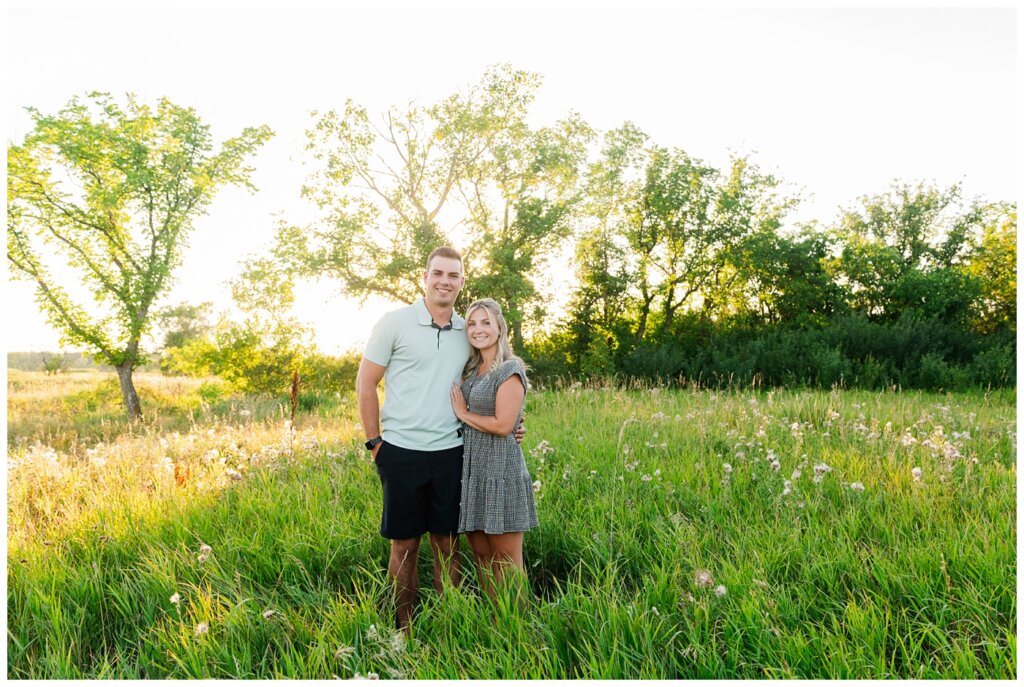 Strachan & McPhee Extended Family - Wascana Habitat Conservation Area - 04 - Couple posing in the summer in tall grass