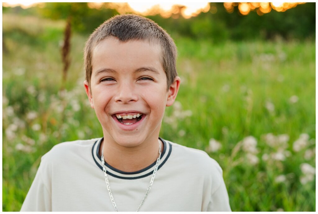 Strachan & McPhee Extended Family - Wascana Habitat Conservation Area - 10 - Boy laughing at camera