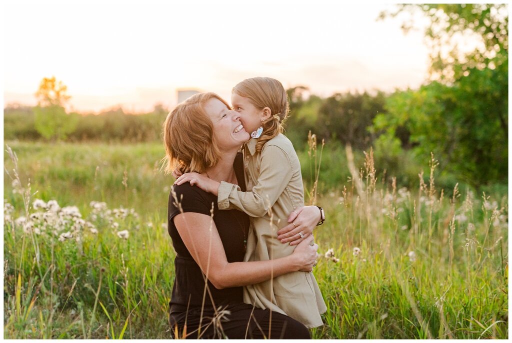 Strachan & McPhee Extended Family - Wascana Habitat Conservation Area - 15 - Mom gets kisses from her daughter