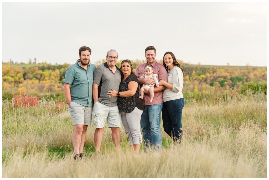 Hachkewich Family - Wascana Trails - 01 - Family stands in tall grass