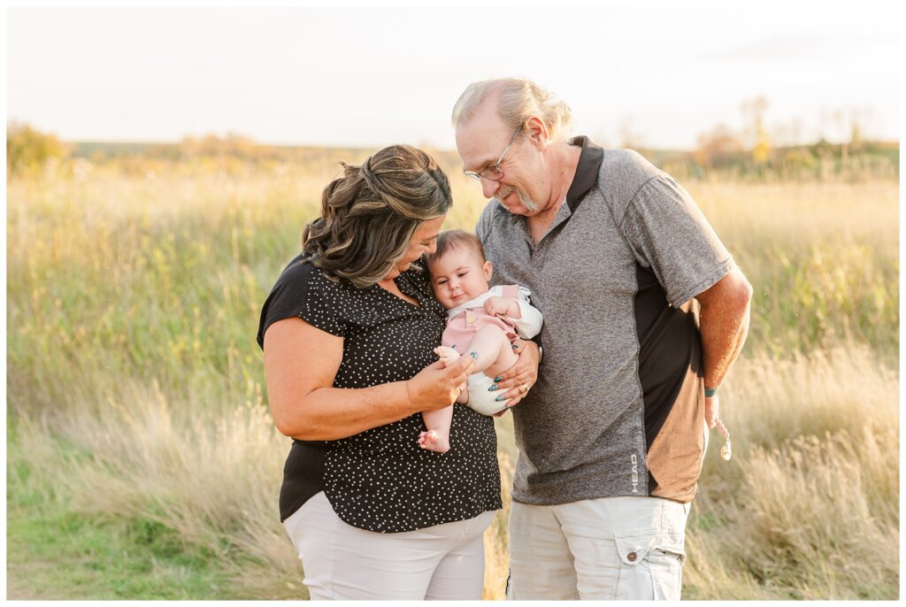 Hachkewich Family - Wascana Trails - 05 - Grandparents cuddle granddaughter