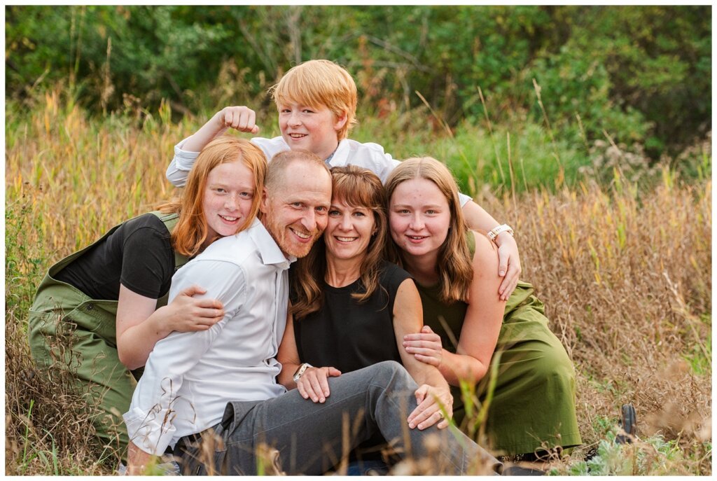 Schoenroth Family - AE Wilson Park - 07 - Kids sneak up on mom & dad in tall grass