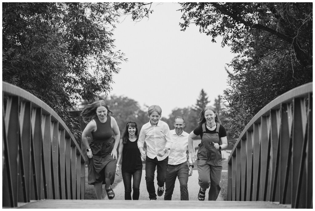 Schoenroth Family - AE Wilson Park - 12 - Three kids run across a bridge