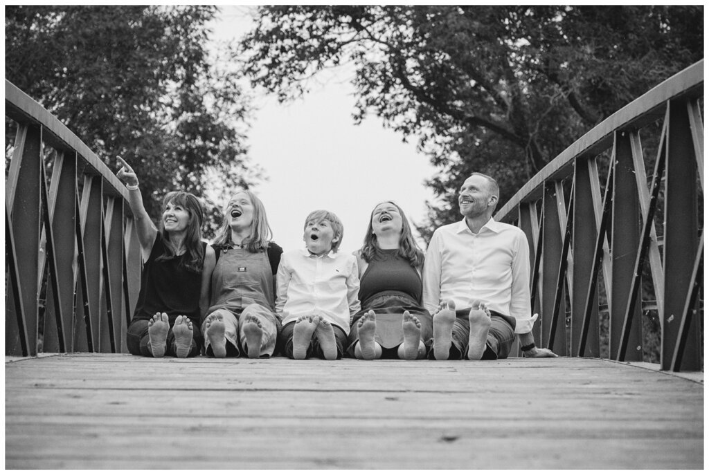 Schoenroth Family - AE Wilson Park - 16 - Family watches as pelicans fly overhead