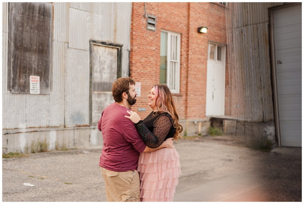 TJ & Danielle - Regina Warehouse District - 06 - Couple dances in the alley