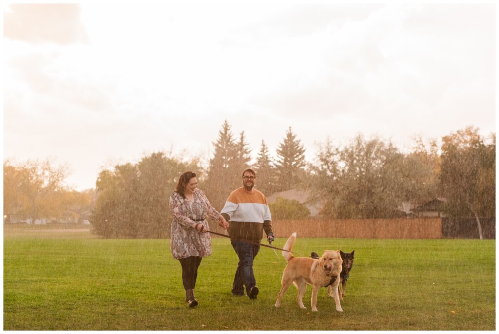 Darren & Amber Engagement - Howell Park - 16 - Couple walks dogs in the rain