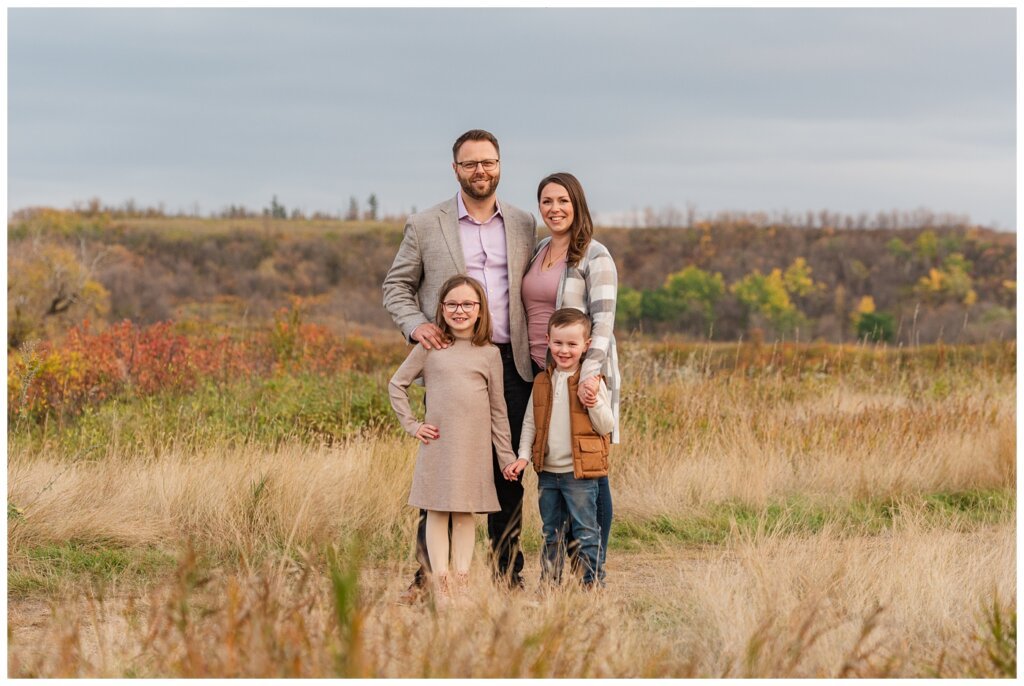 Zurowski Family - Wascana Trails - 01 - Family stands in the tall grass