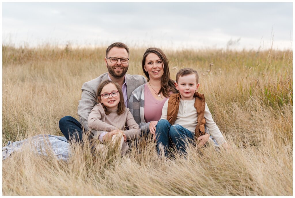 Zurowski Family - Wascana Trails - 06 - Family sits in tall grass