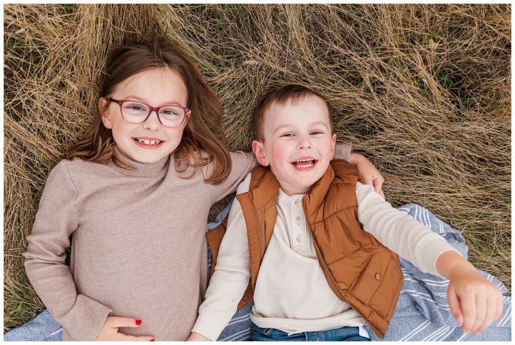 Zurowski Family - Wascana Trails - 08 - Brother & sister lay down in grass