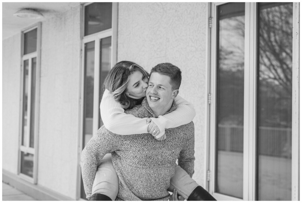 Michael & Briana - Engagement Session - 06 - UofR - Piggy Back ride in Black and White