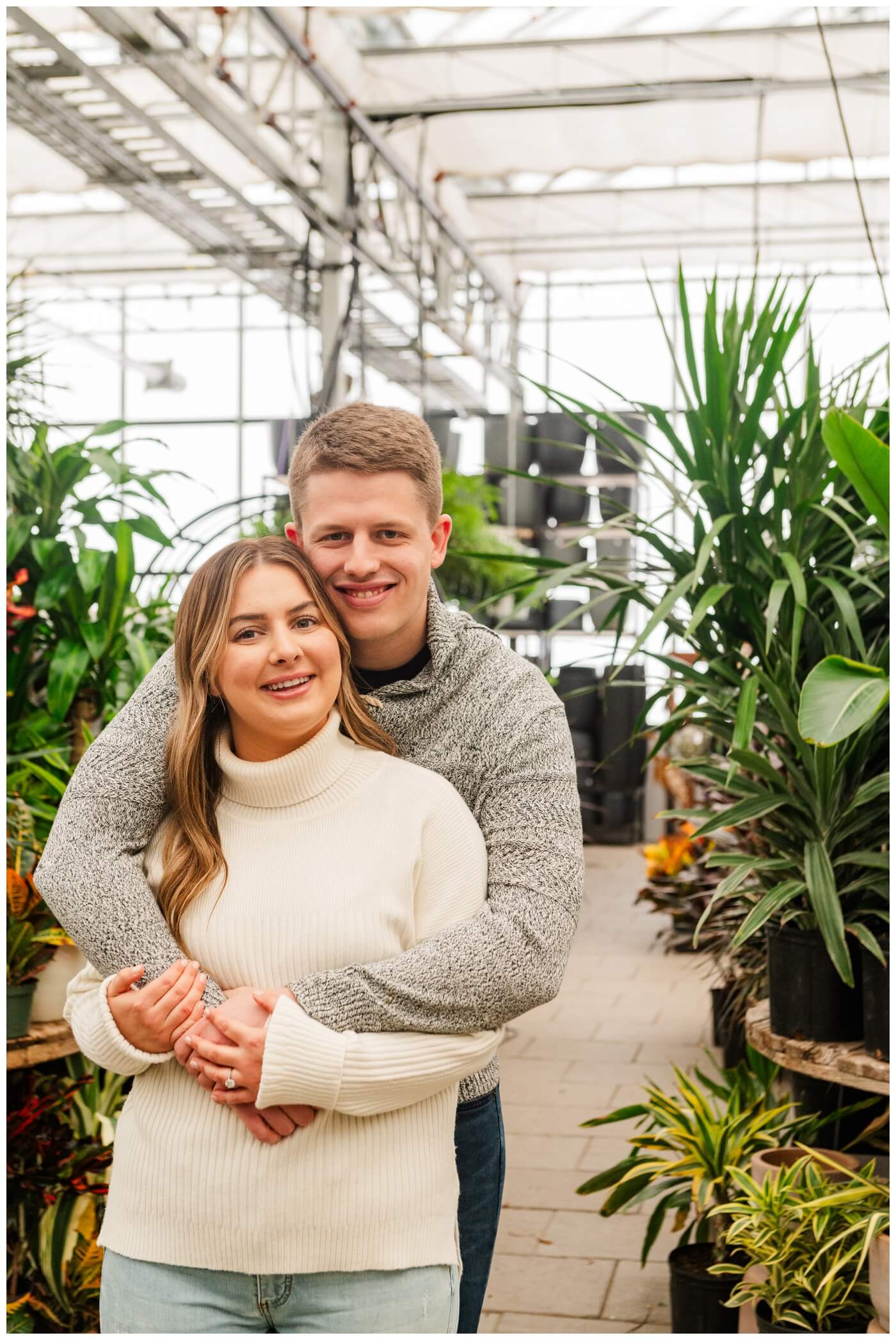 Michael & Briana - Engagement Session - 18 - Dutch Growers - Couple posing in greenhouse