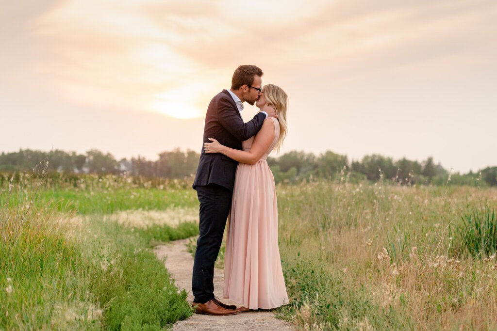 Couple at Sunset Kissing - Regina Eloping Photographers