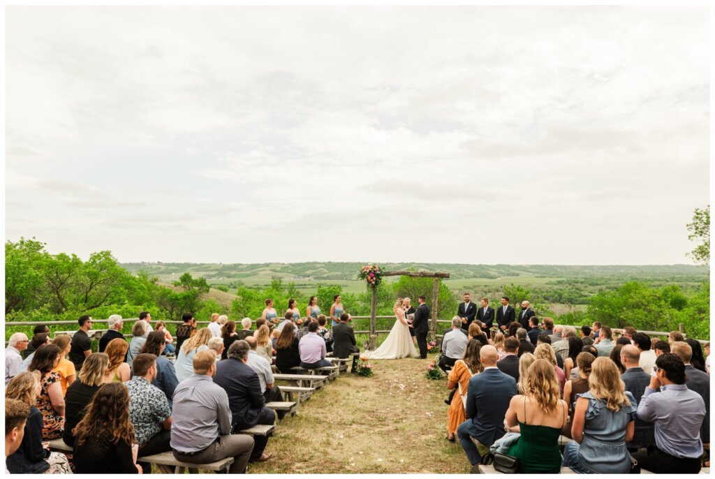 Darcy & Maddie - Regina Summer Wedding - 012 - Goodsman Farm - Ceremony overlooking Qu'Appelle Valley