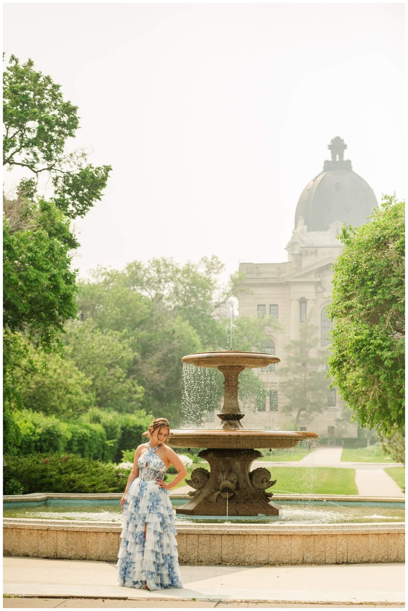 Isabelle Grad 2025 - Sask Legislative Building - 010 - Grad at the Trafalgar Fountain