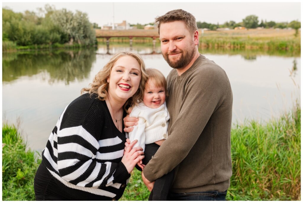 Lindskog Family - AE Wilson Park - 006 - Family smiles by the lake